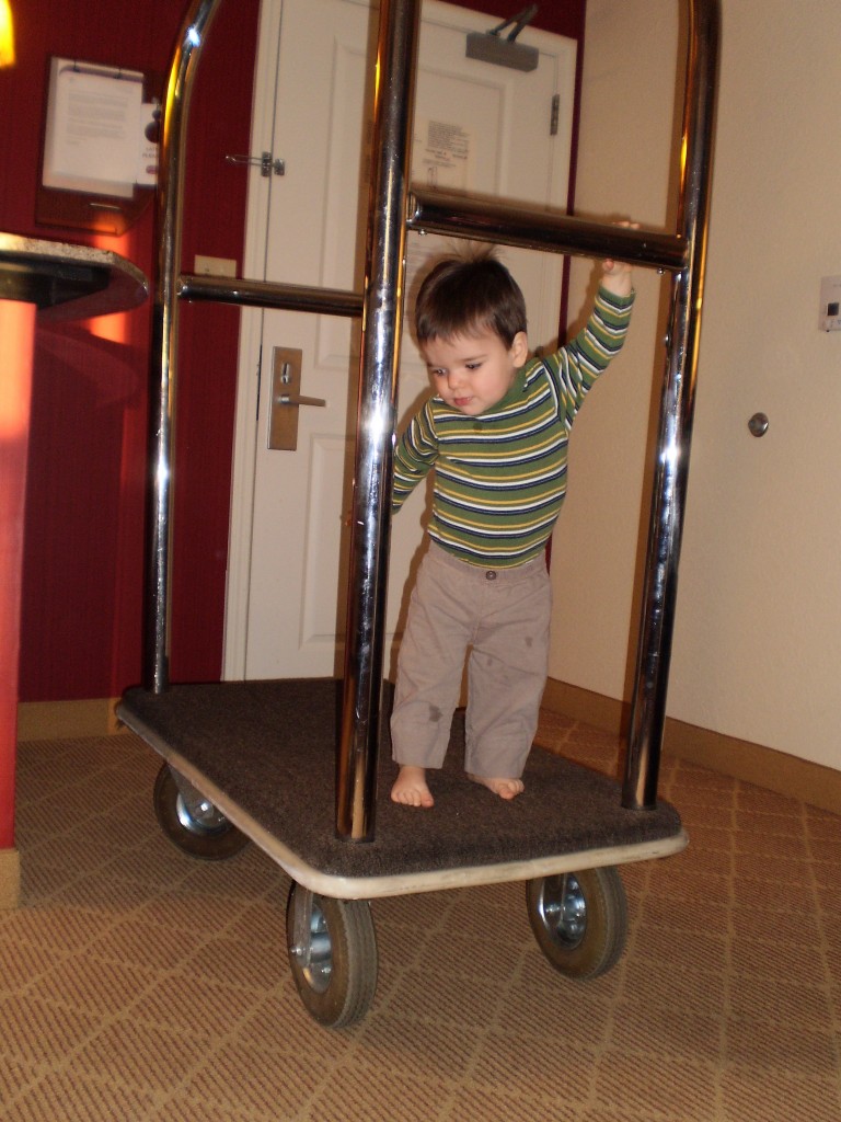 Climbing on the luggage cart